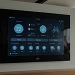 Smart Home controlling multiple integrated systems including lighting, climate, security, and entertainment through centralized interface