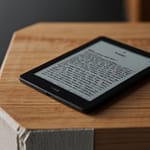 Kindle e-reader displaying paper-like reading experience with e-ink technology and front lighting system